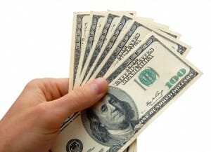 Money in the Hand Depositphotos_2009499_s