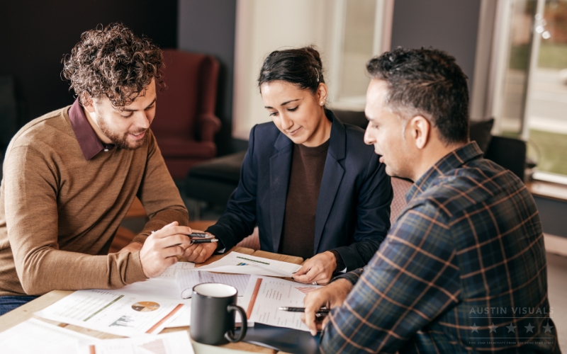 business team discussing project documents