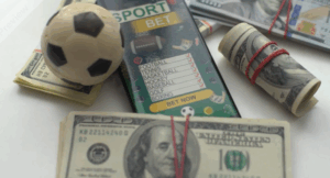 sports betting money soccer ball and cash stacks