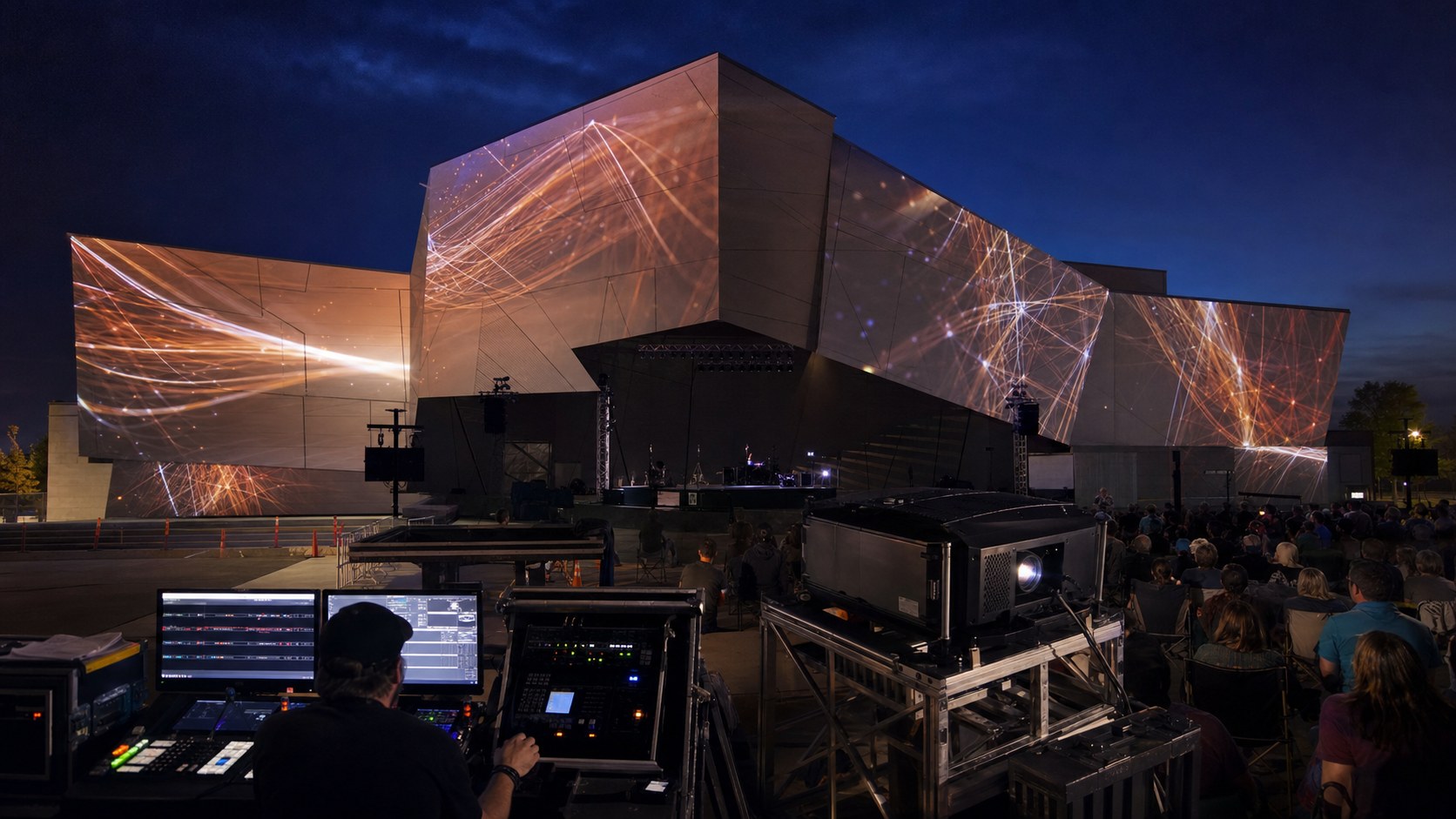 Huntsville projection mapping team testing animated content on an architectural surface