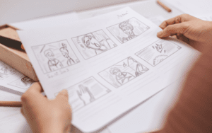 An illustrated storyboard with scene descriptions and visual concepts for creating an animated video ad