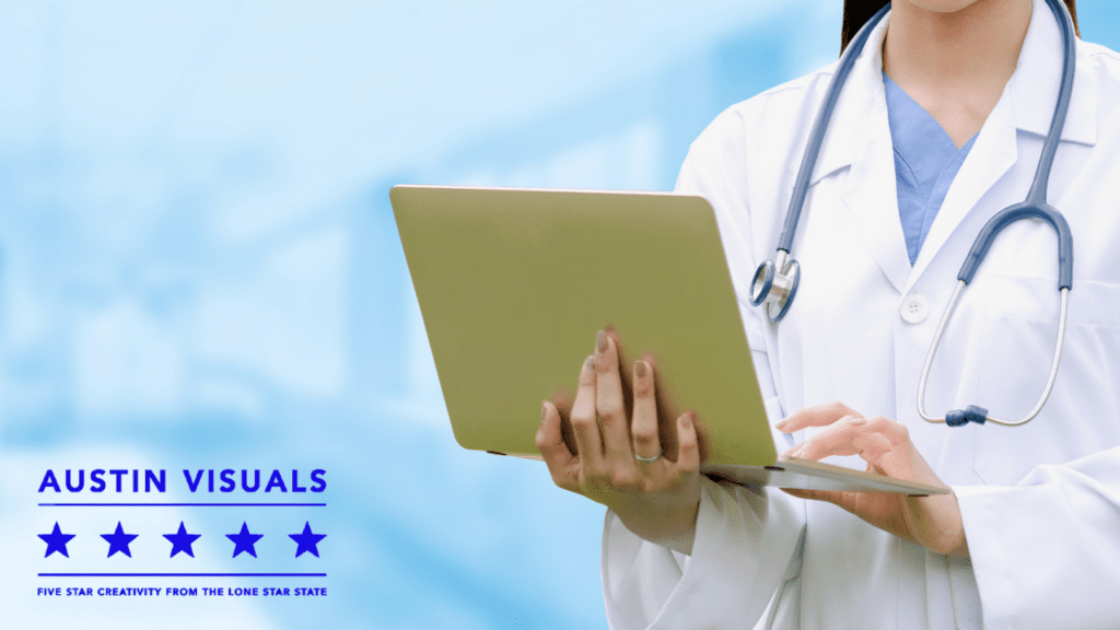 a medical doctor holding up a laptop checking on her scheduled visits at the hospital