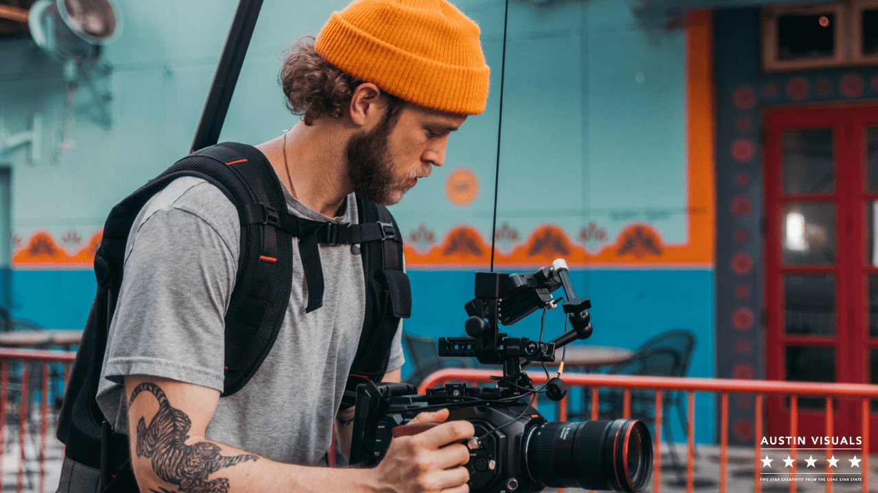 Austin Videographer preparing his video recorder camera for the next shoot