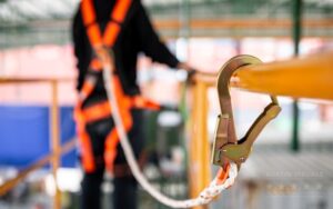 construction safety harness secured to railing for workplace protection animation services