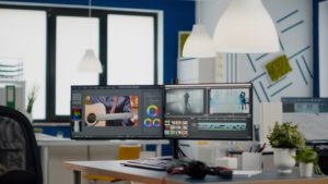 empty-modern-creative-agency-office-with-dual-monitors-setup-with-processing-video-film-montage-vide_482257-3406