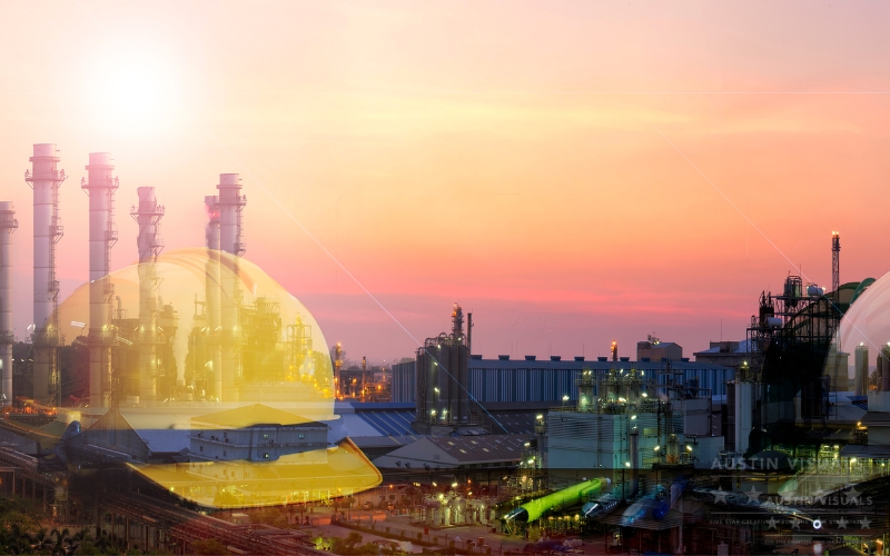 industrial facility with sunset background and overlay of yellow hard hat representing workplace safety